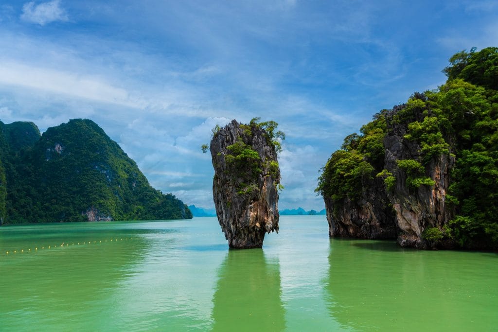 Koh Tapu, the rock pillar known as James Bond Island, rising from green water in Phang Nga Bay