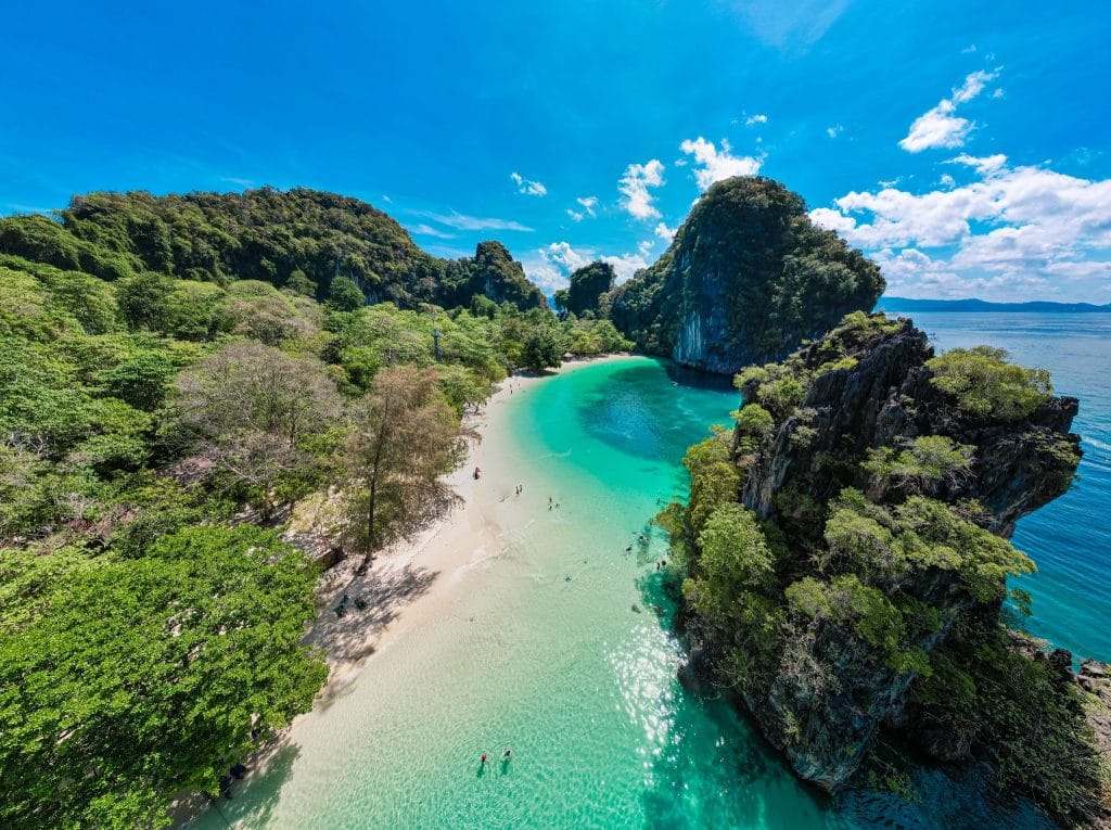 Aerial view of the white-sand beach and turquoise lagoon water at Koh Hong in Krabi