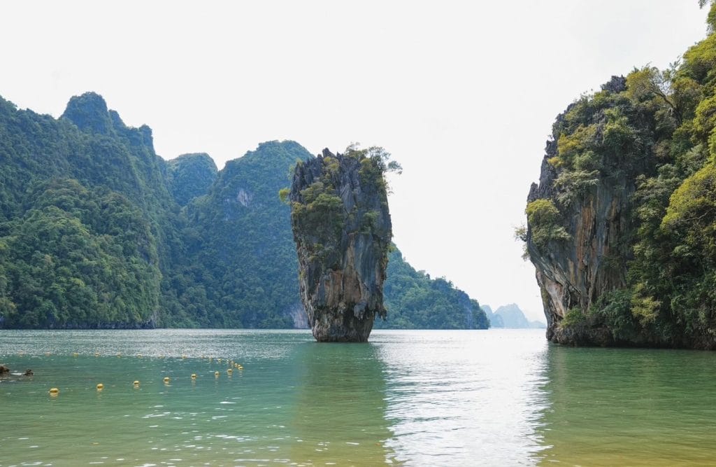 Koh Tapu, the limestone pillar known as James Bond Island, rising from the green water of Phang Nga Bay
